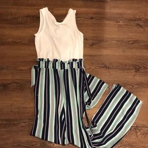 white and blue romper size small worn once